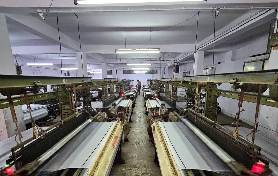 Looms running inside the Bindiya Textile factory in Surat