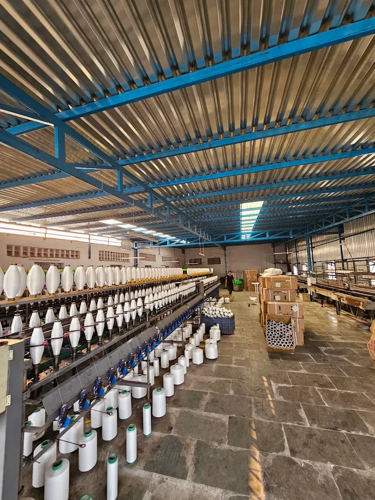 Yarn preparation machines inside the Bindiya Textile factory