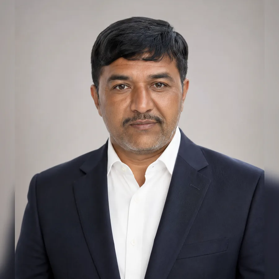 Portrait of Mr. Anilbhai Patel, founder of Bindiya Textile